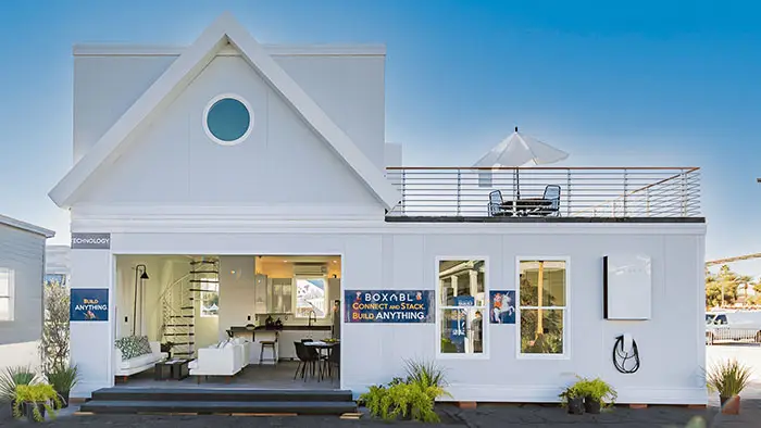 a white house with a balcony