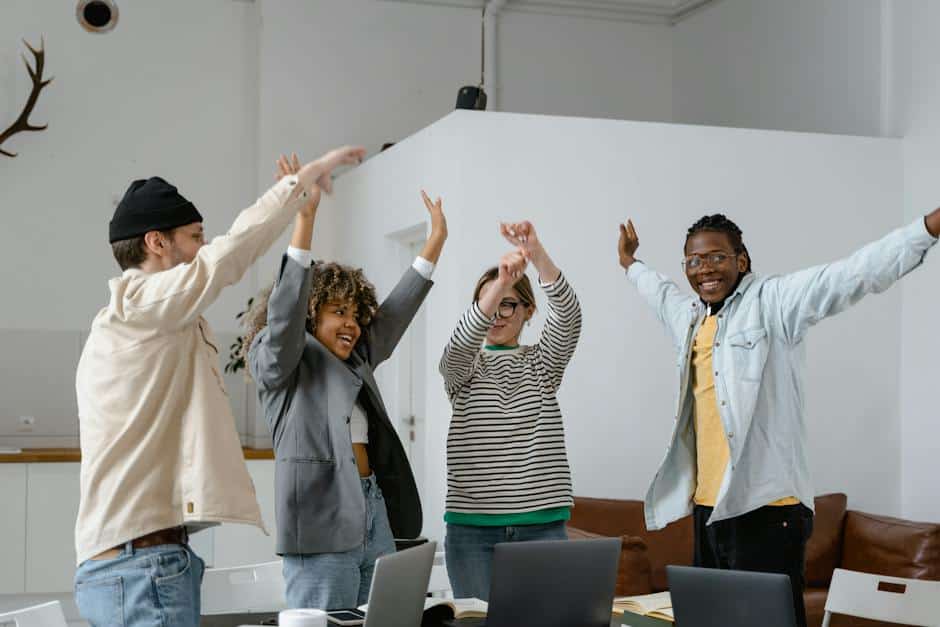 Image showing a group of diverse real estate professionals celebrating their success, symbolizing the triumph of overcoming adversity in the industry.